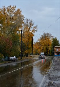 city streets on a rainy autumn day photo