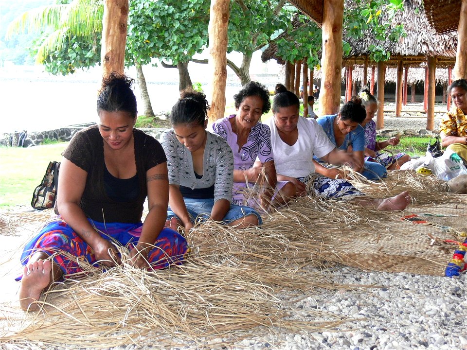 Women weaving fine mats in American Samoa photo