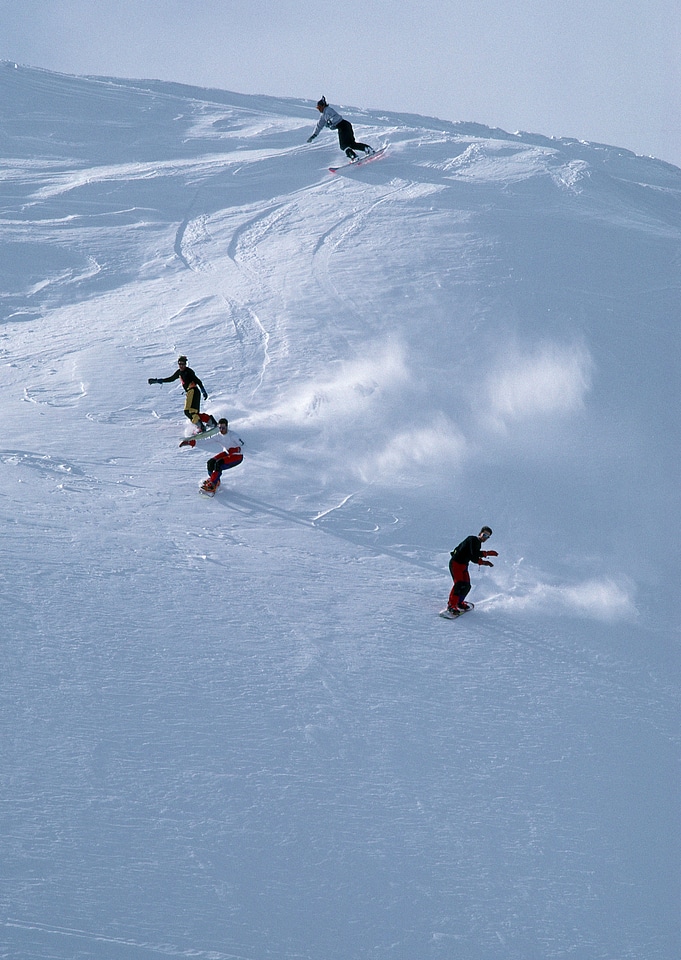 Alpine skier skiing downhill