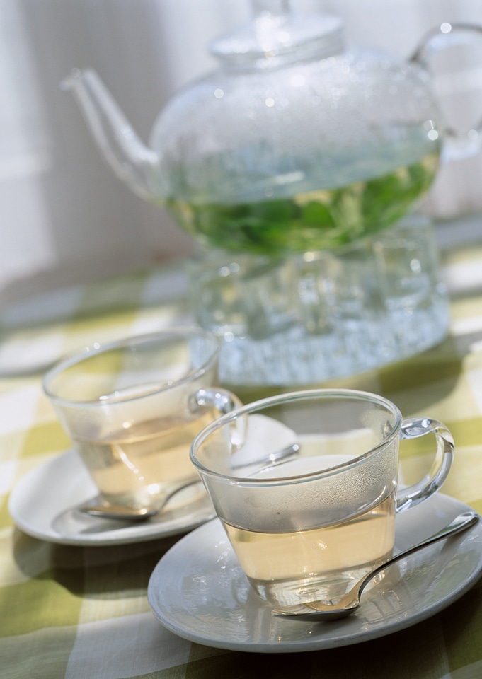 teapot and cup with linden tea