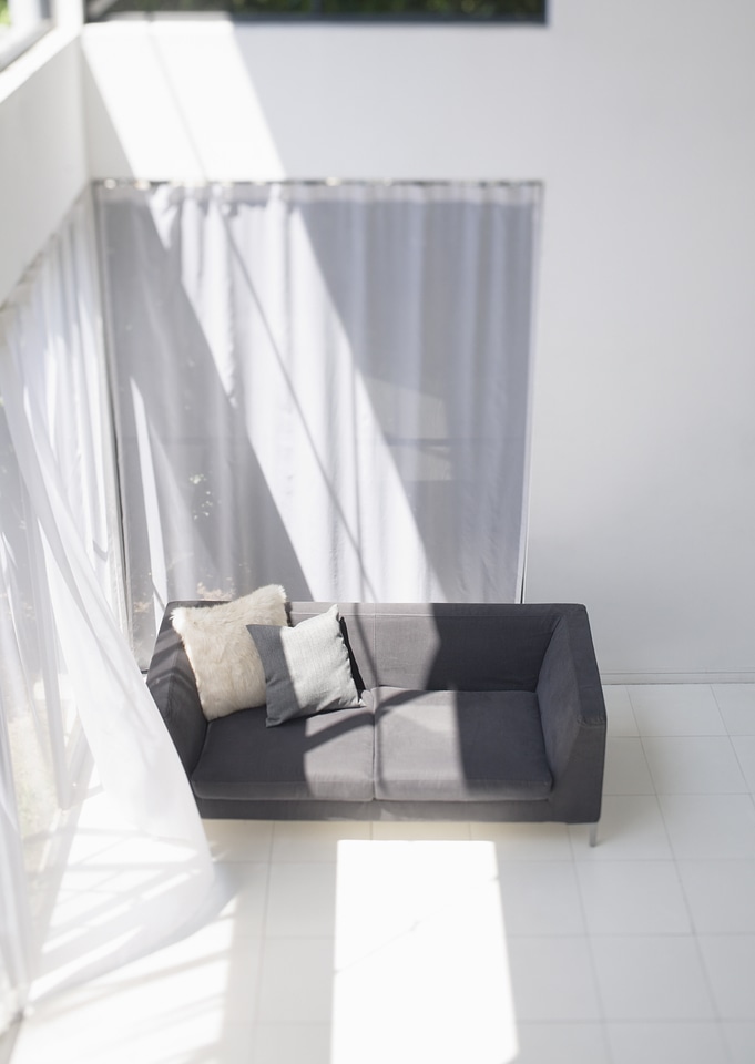 modern furnished living room with arched window