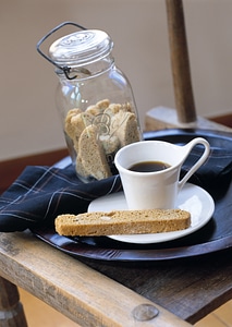 Hot Coffee with bread and cookies bottle photo