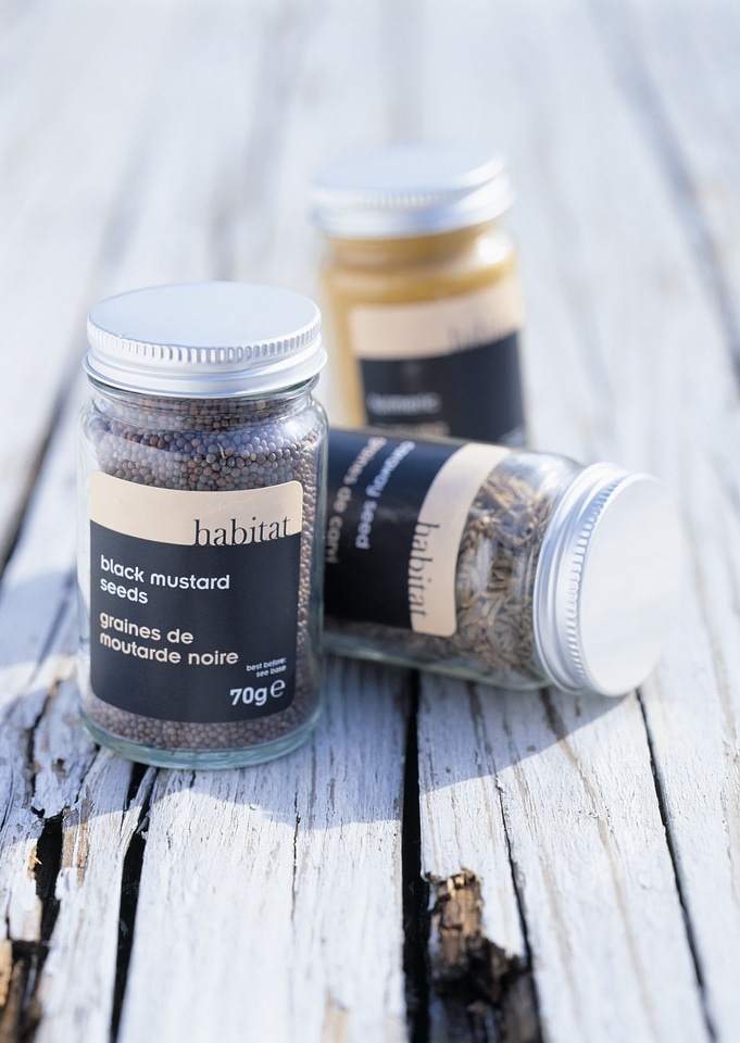 Dried fennel seeds in a bottle