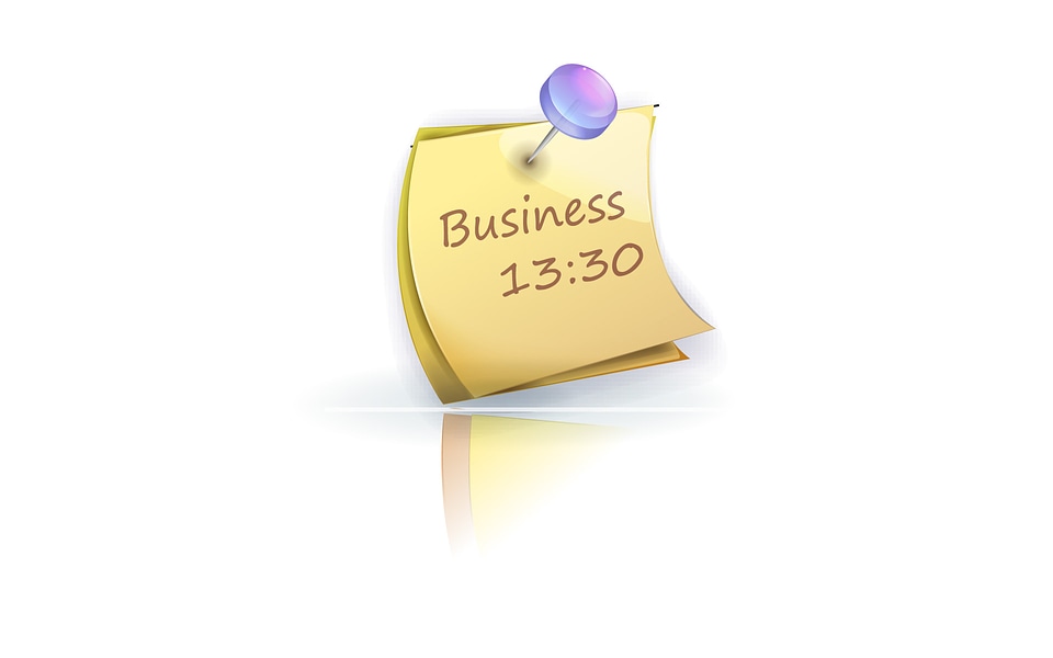 Yellow paper note with text business