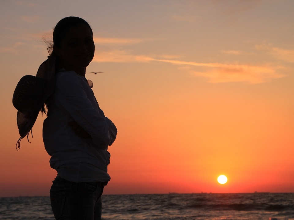 Woman Silhouette at Sunrise