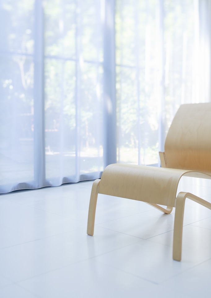 Wooden chair in living room background big window