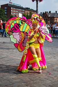 Unknown woman dancing samba on the street