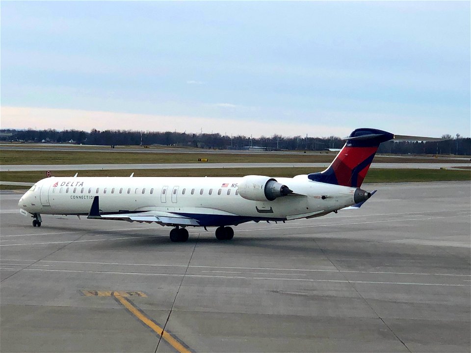 Delta Connection CRJ-900 departing ROC
