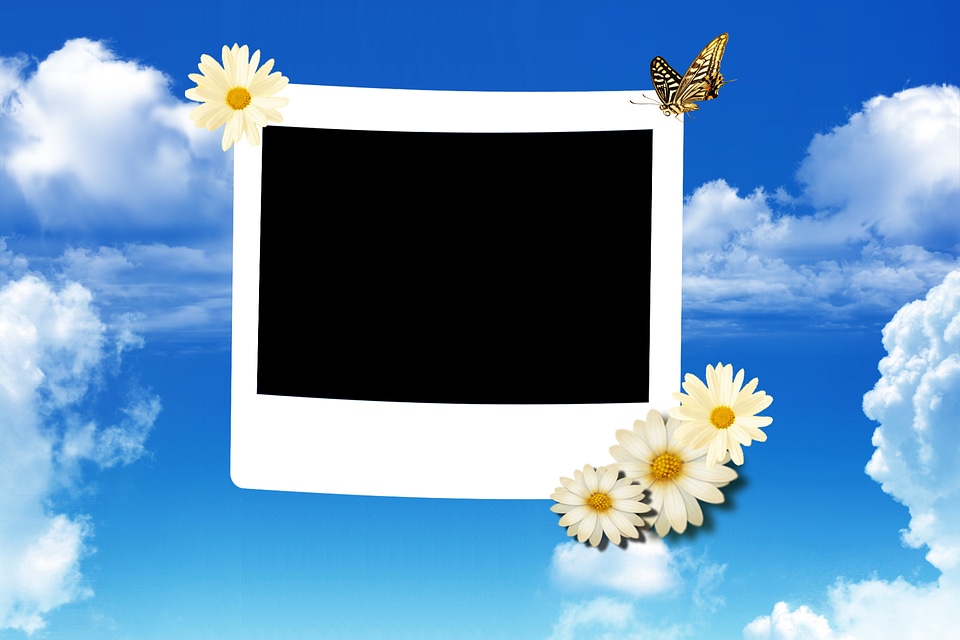 Photo frame on sky background