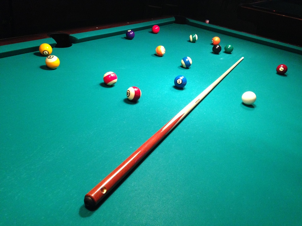 Billiard balls in a pool table