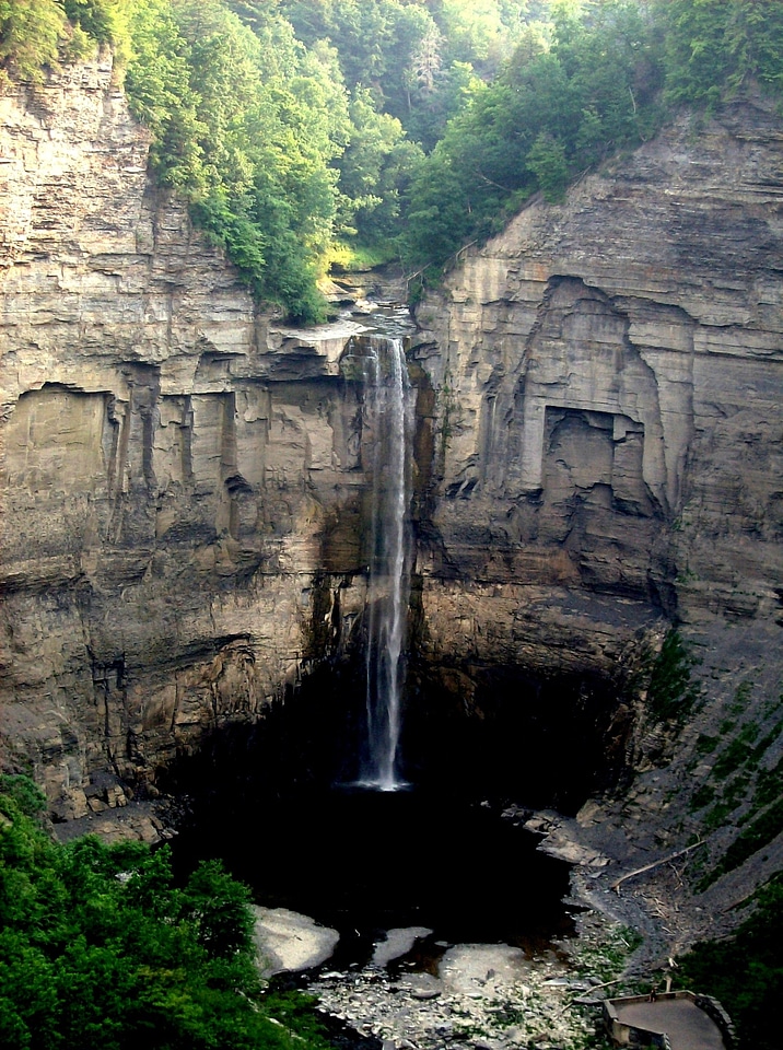 Magnificent waterfall dropping over shale cliffs