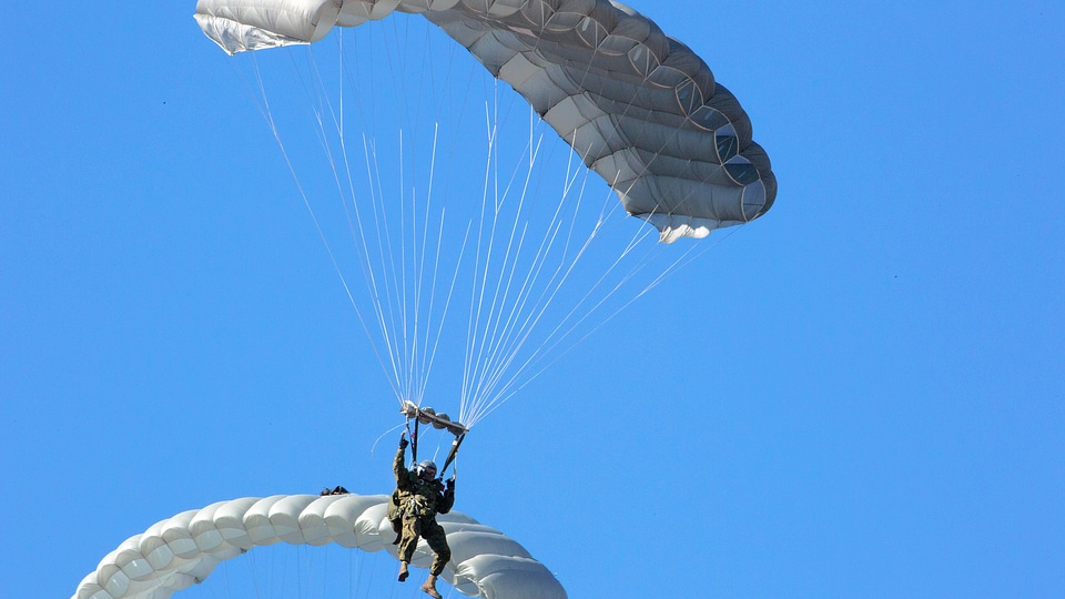 Marine parachutes toward the ground
