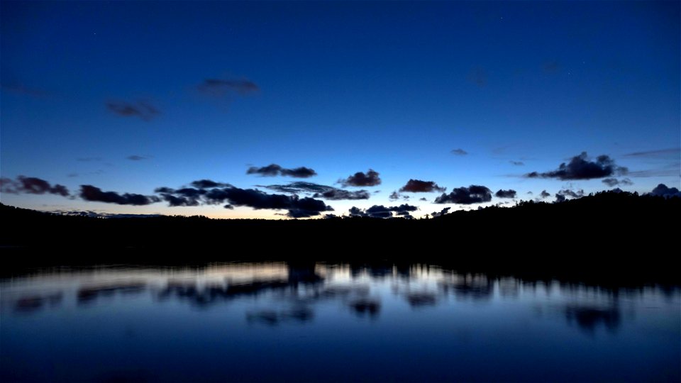 Clouds over Brofjorden at blue hour 2 photo