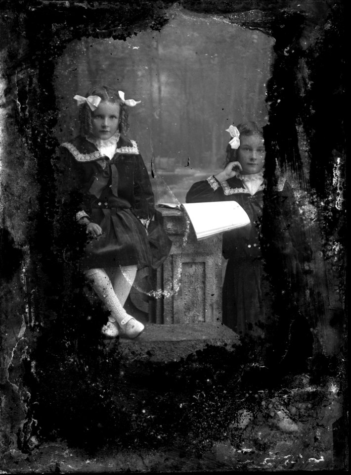 Two girls and book, n.d.