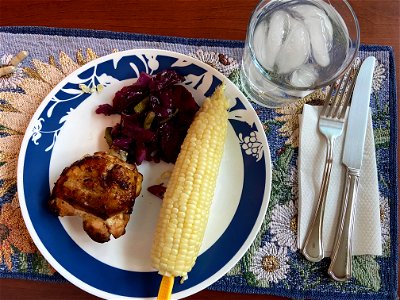Chicken thigh, Red cabbage, Sweet corn on the cob photo
