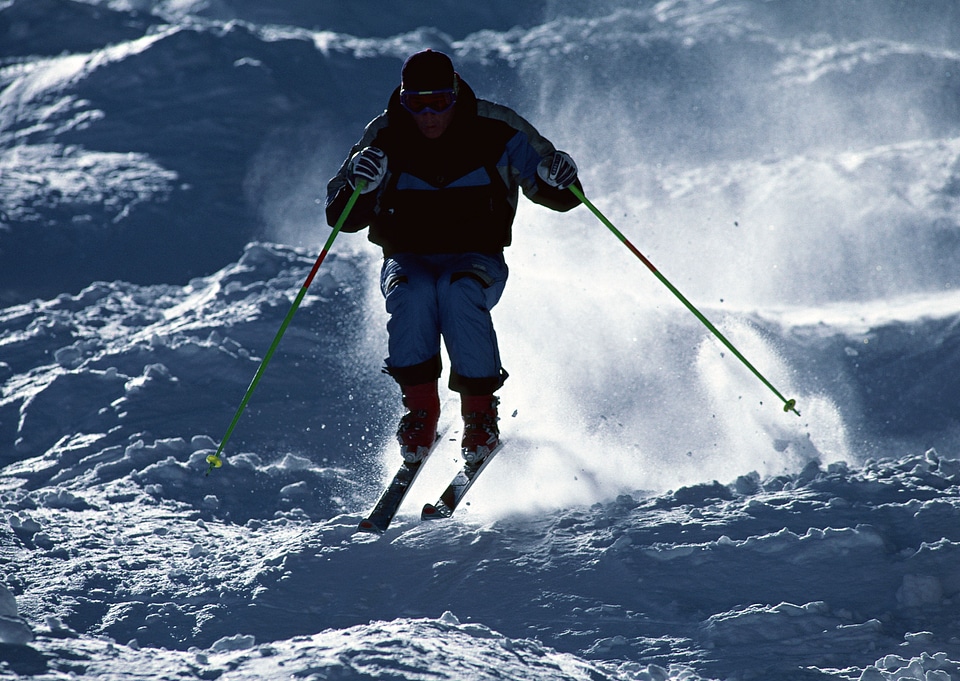 Silhouette of a skier on the hill