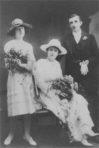 Studio photo of a bride, bridegroom and bridesmaid, [1920s]