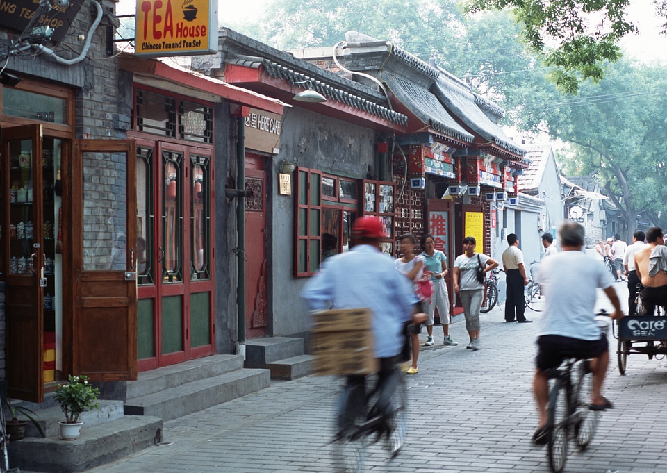 Chinese people reading their bike