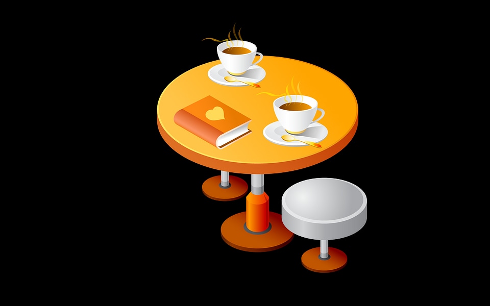 Two cup of coffee on table.