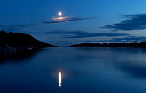 Waxing half moon over Brofjorden 1 photo