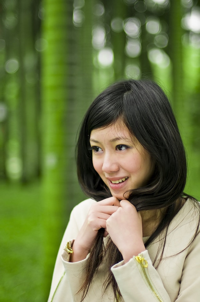 Chinese Girl Posing In The Woods