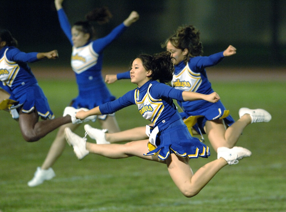 Cheerleaders Jumping In The Air