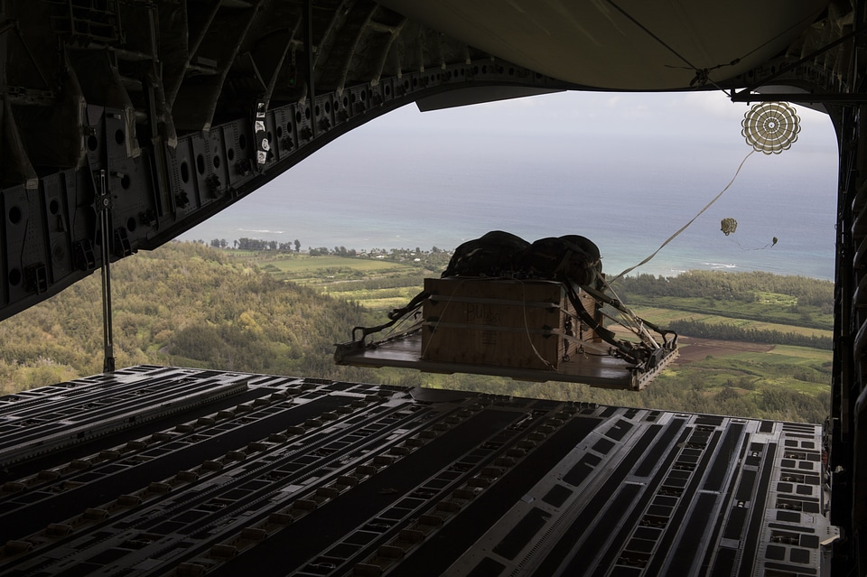 A C-17 Globemaster III airdrops a pallet