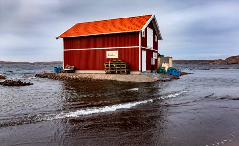 Building in a flooded area of Lysekil during Storm Ciara photo