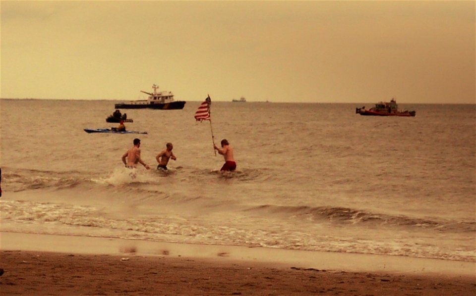 Polar Bears raise a USA Flag