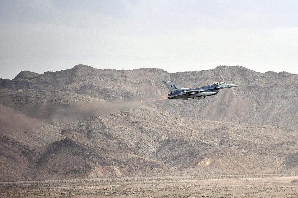 An F-16 Fighting Falcon takes off for a sortie training mission