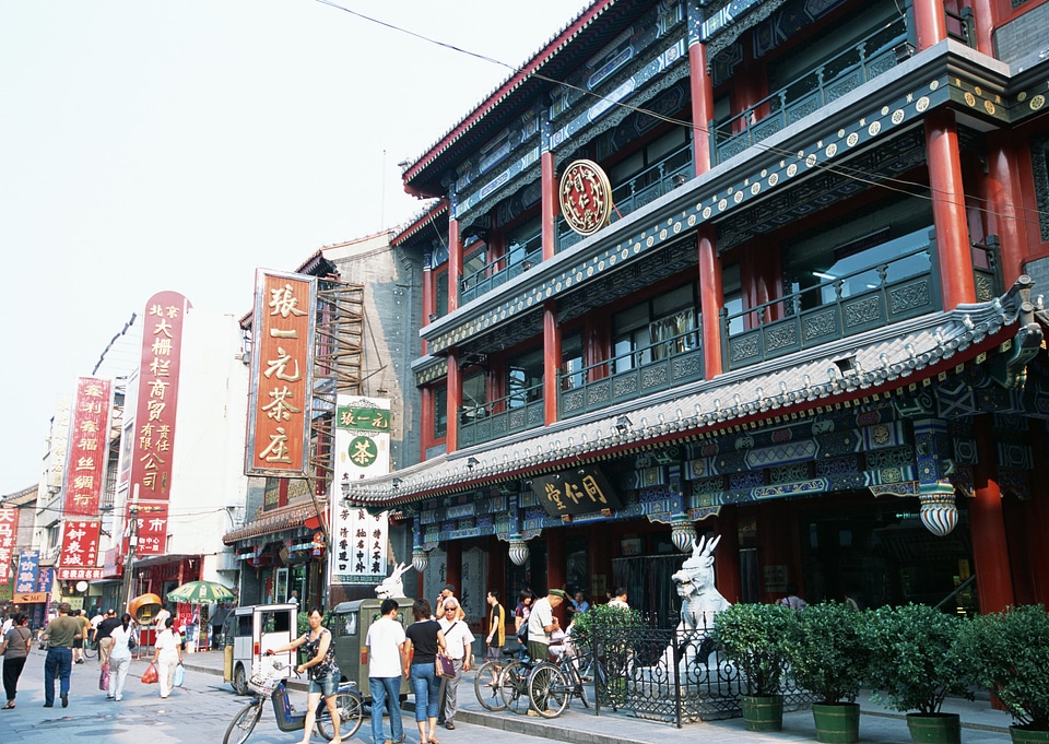 Visitors enjoy the sightseeing at the famous Qianmen Street
