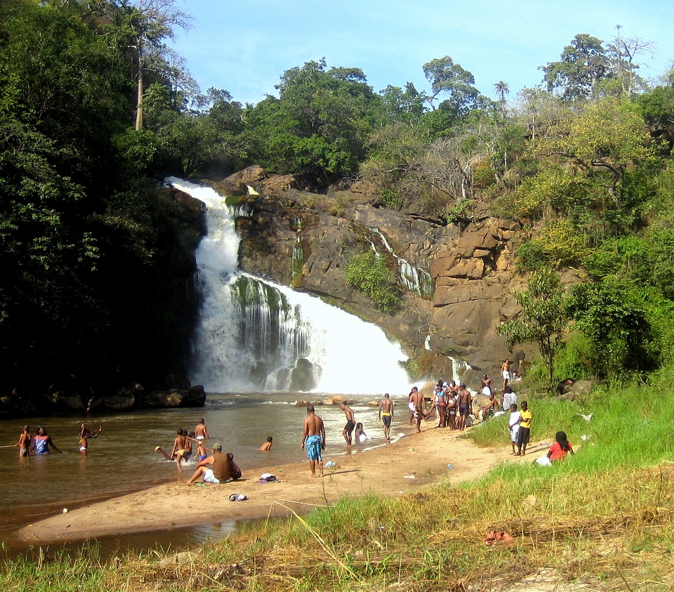 Angolan people at waterfall