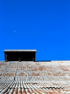 Moon over tin roof