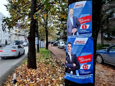 Posters with councilor candidate on tree in Cara Lazara street in Banja Luka