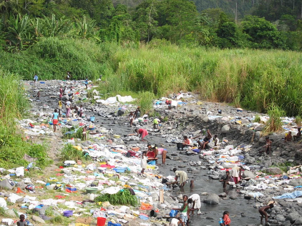 Sao Tomean Women Washing Laundry at River