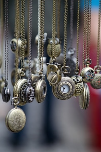 A number of pocket watches on chain