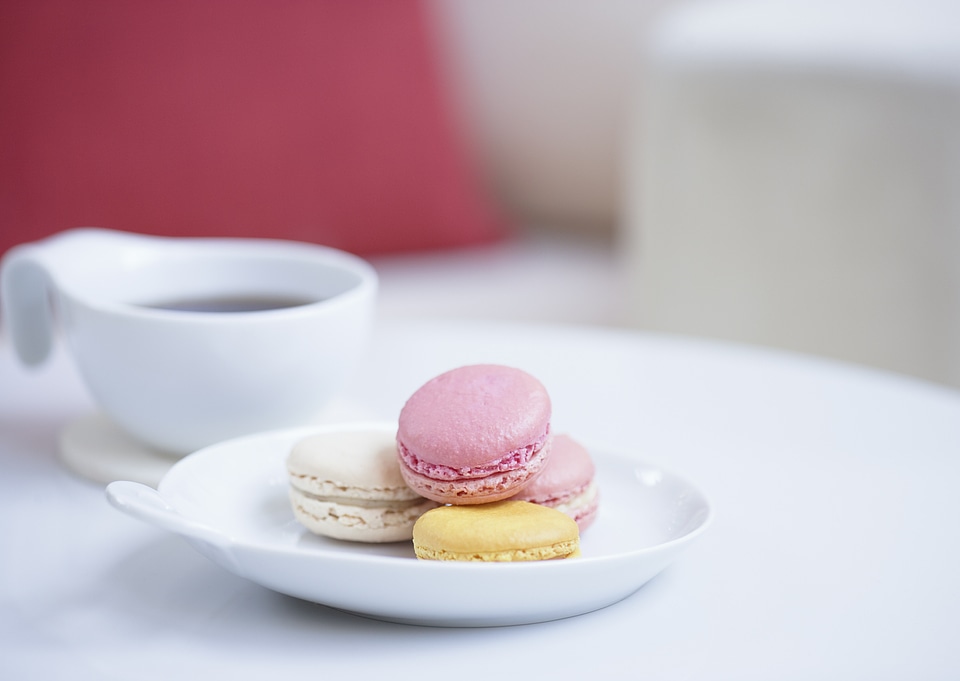 A cup of coffee and pastries