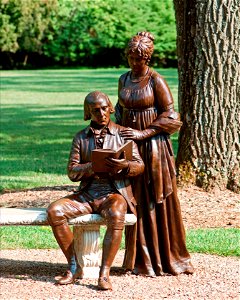 "Behind every great man is a great woman"