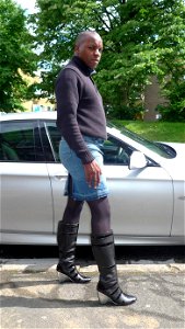 Denim Skirt, tights and boots. photo