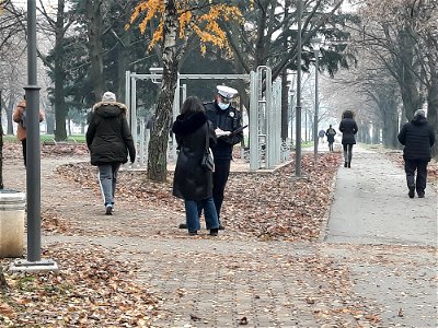 Policeman punishes a woman who crossed Bulevar Desanke Maksimović outside of pedestrian crossing, Starčevica, Banja Luka, Bosnia and Herzegovina