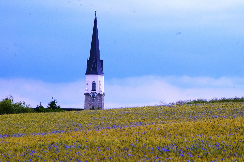 A small Christian Church on a hill