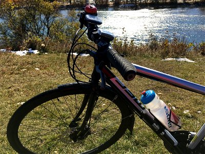 Biking along the Bow River at Baker Park photo