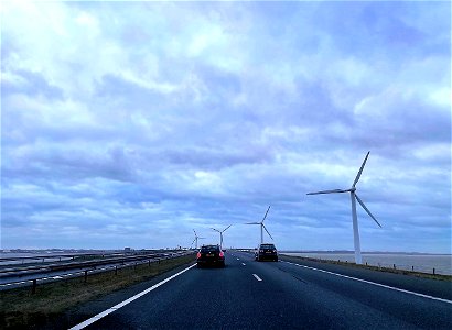 Windmills and cars photo