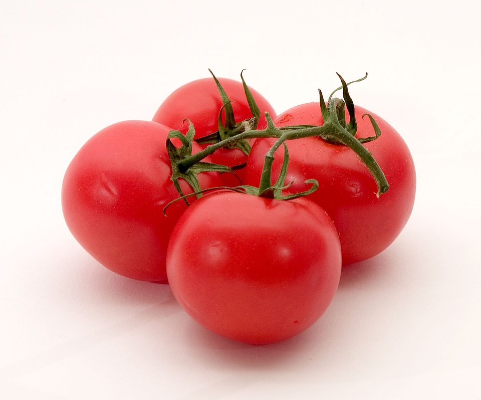 Red Tomatoes Isolated On A White Background