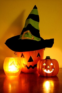 Halloween Jack-o-Lantern Bucket with Witch Hat and Candles photo