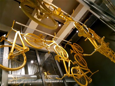 Hanging yellow bikes photo
