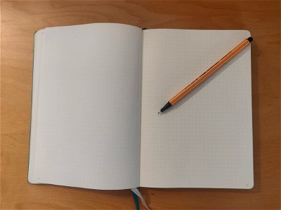 Notebook and pen photo
