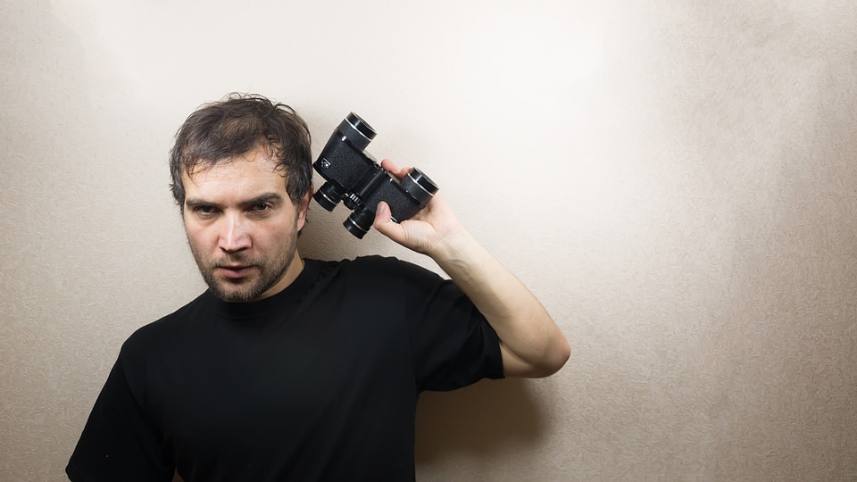 young man with binoculars