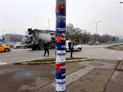 Posters with candidates for councilors of Banja Luka's city assembly on the lamppost at the crossing of Bulevar vojvode Petra Bojovića with Bulavar vojvode Živojina Mišića