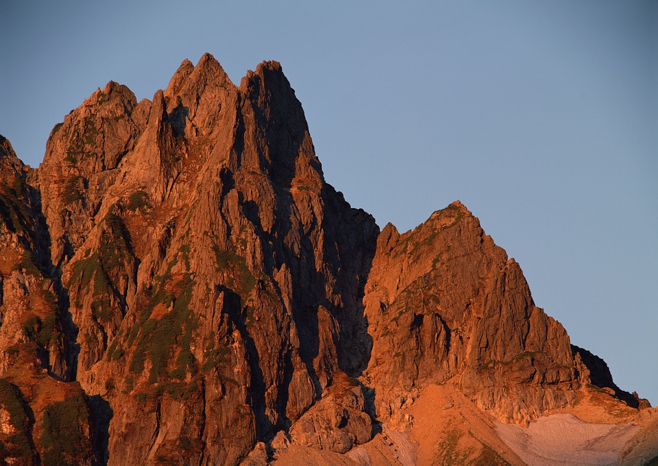 Beautiful sunsets in the autumn alpine mountains.